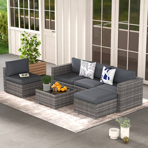 Latitude Run® Eudy 6 Piece Rattan Sectional Seating Group with Cushions